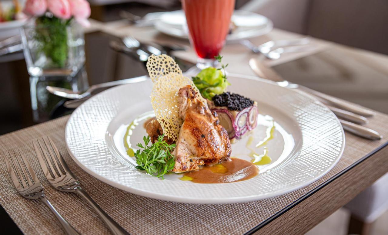 Waves Aqua Resort Kenitra Exterior photo A modern French dish