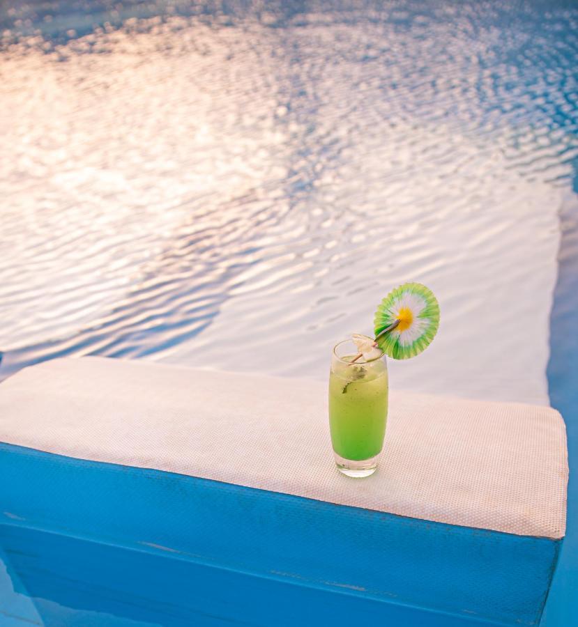 Waves Aqua Resort Kenitra Exterior photo A Blue Hawaii cocktail