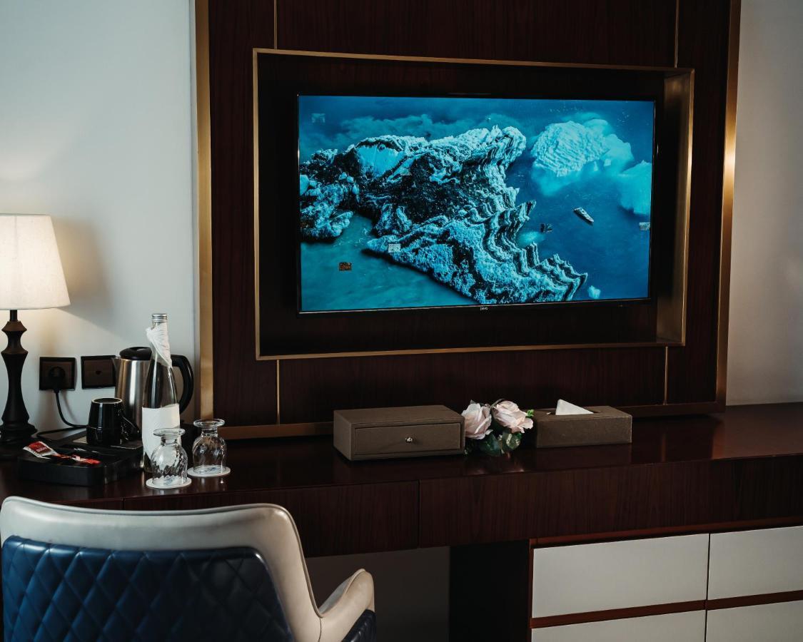 Waves Aqua Resort Kenitra Exterior photo A television in a hotel room