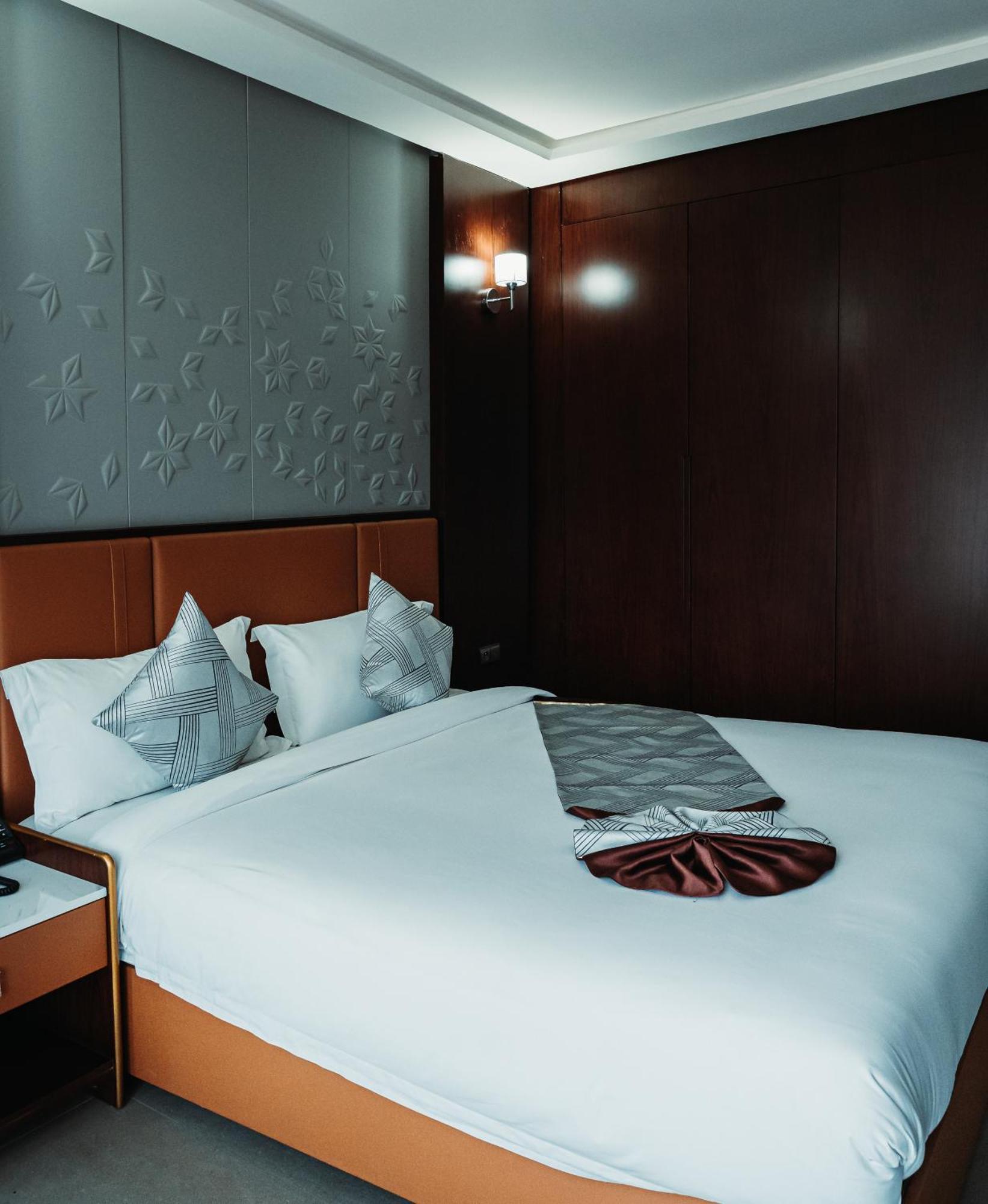 Waves Aqua Resort Kenitra Exterior photo A bed in a hotel room